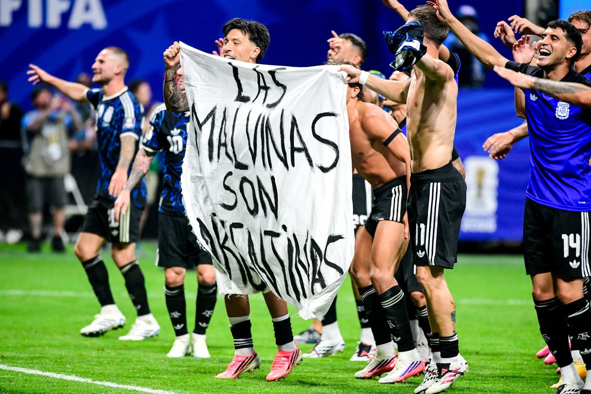 Players of Argentina hold a banner after the FIFA World Cup 2026 Semi Final match between England and Argentina at Atlanta Stadium on July 15, 2026 in Atlanta, Georgia. The banner refers to the British Overseas Territory of the Falkland Islands, located off the coast of Argentina. Argentina disputes British sovereignty over the islands and refers to them as Las Malvinas.