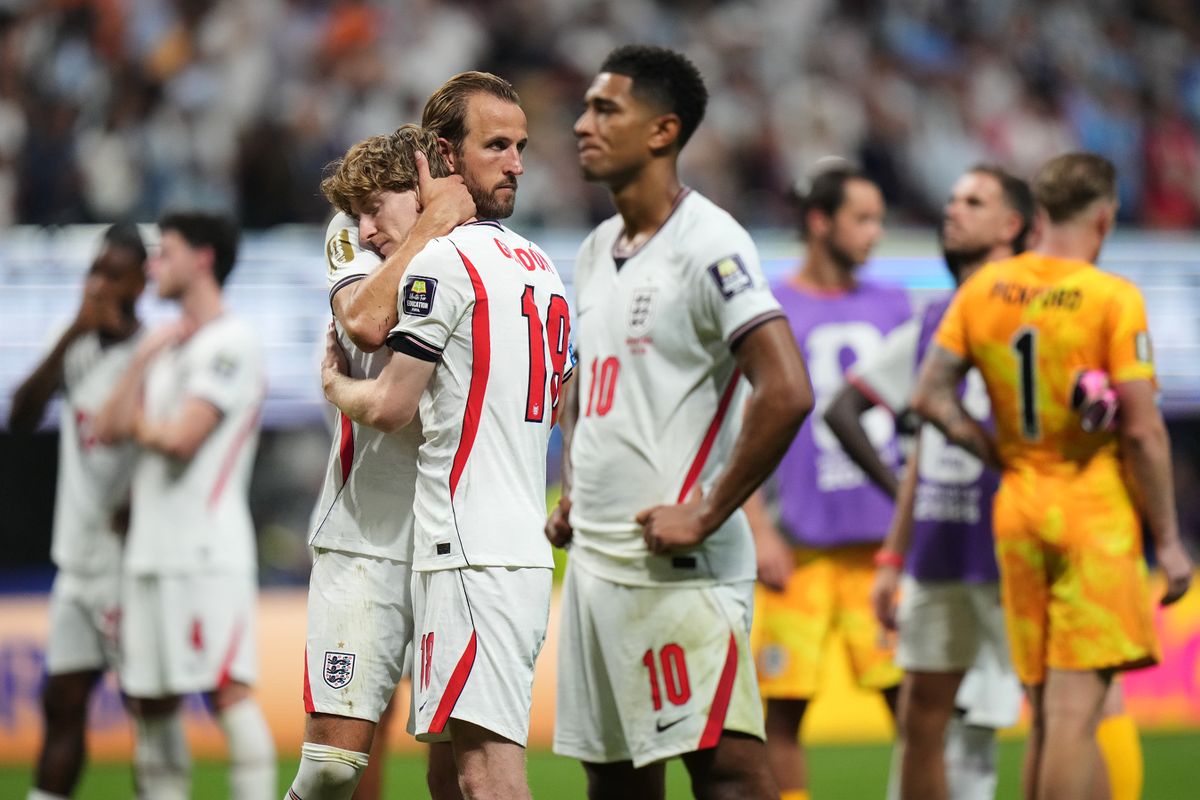 England's Harry Kane (9), Anthony Gordon (18) and Jude Bellingham (10) react after the World Cup semifinal soccer match between England and Argentina in Atlanta, Wednesday, July 15, 2026