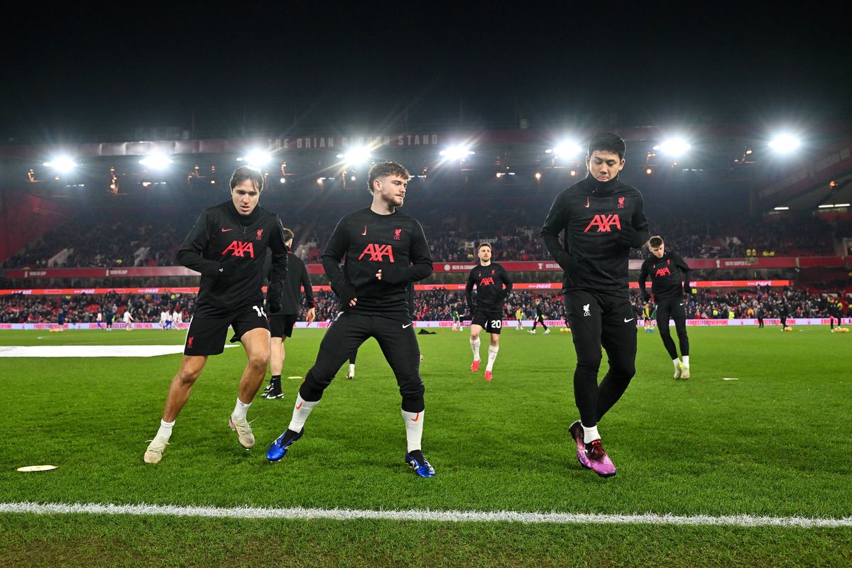 Federico Chiesa, Harvey Elliott and Wataru Endo of Liverpool warm up prior to the Premier League match between Nottingham Forest FC and Liverpool FC