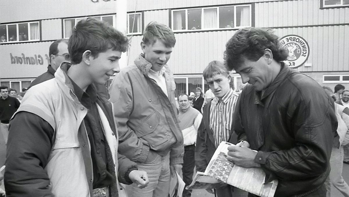 Kevin Keegan signing autographs prior to the opening of Glanford Park, then Scunthorpe United's new ground, in 1988