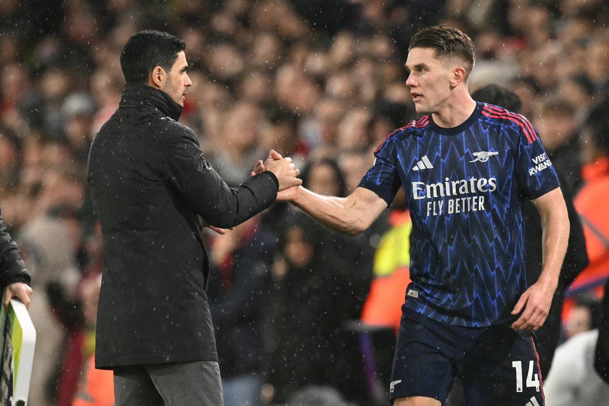 Arsenal's Swedish striker #14 Viktor Gyokeres (R) shakes hands with Arsenal's Spanish manager Mikel Arteta (L) as he is substituted during the English Premier League football match between Leeds United and Arsenal at Elland Road in Leeds, northern England on January 31, 2026. (Photo by Oli SCARFF / AFP via Getty Images) / RESTRICTED TO EDITORIAL USE. No use with unauthorized audio, video, data, fixture lists, club/league logos or 'live' services. Online in-match use limited to 120 images. An additional 40 images may be used in extra time. No video emulation. Social media in-match use limited to 120 images. An additional 40 images may be used in extra time. No use in betting publications, games or single club/league/player publications. /
