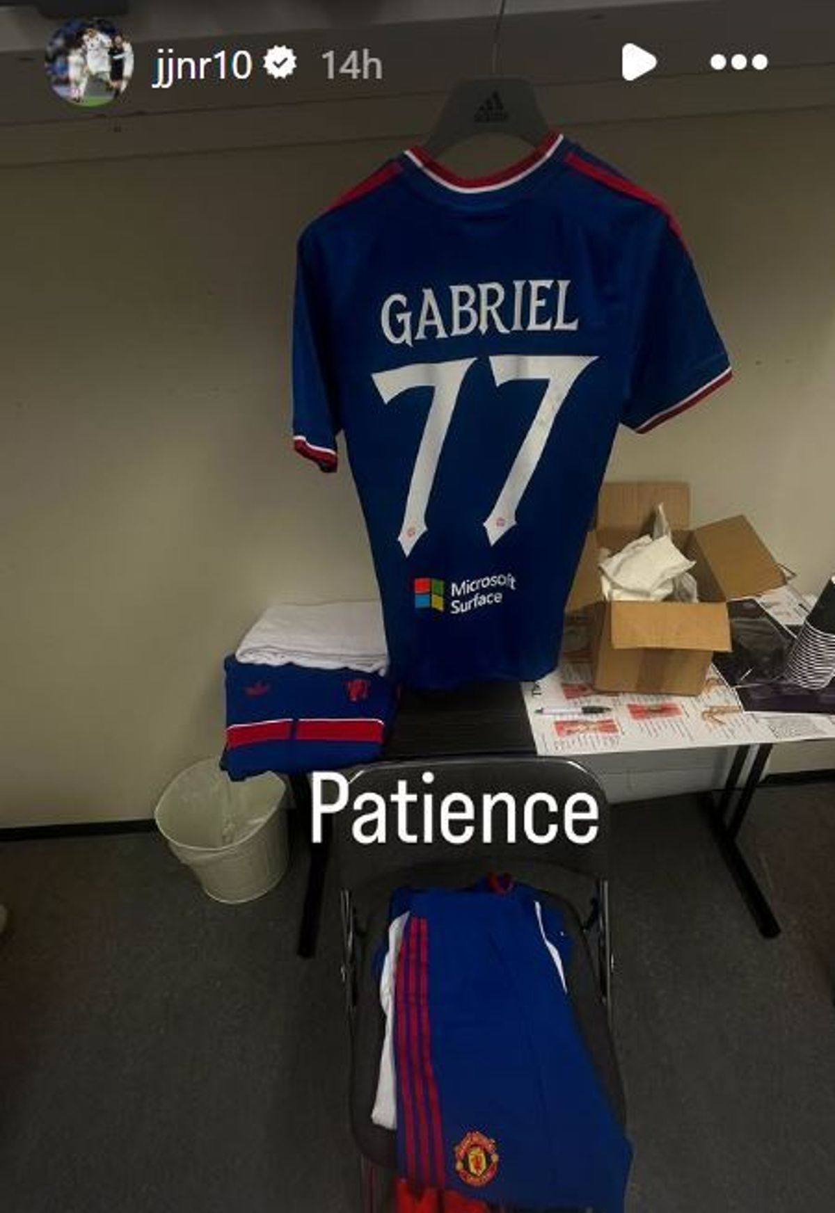 A photo shared on JJ Gabriel's Instagram story showing his Manchester United kit laid out with the word 'patience'