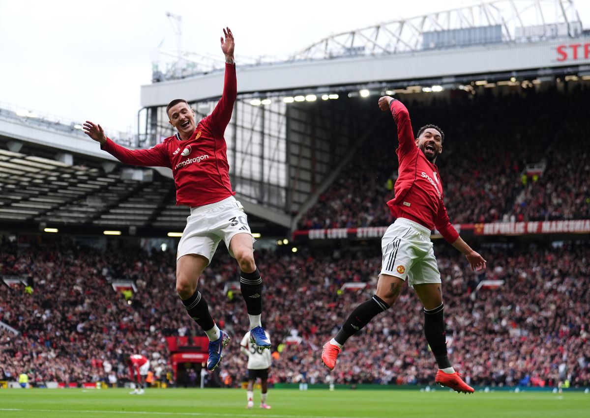 Benjamin Sesko and Matheus Cunha celebrate the former's goal for Manchester United against Liverpool