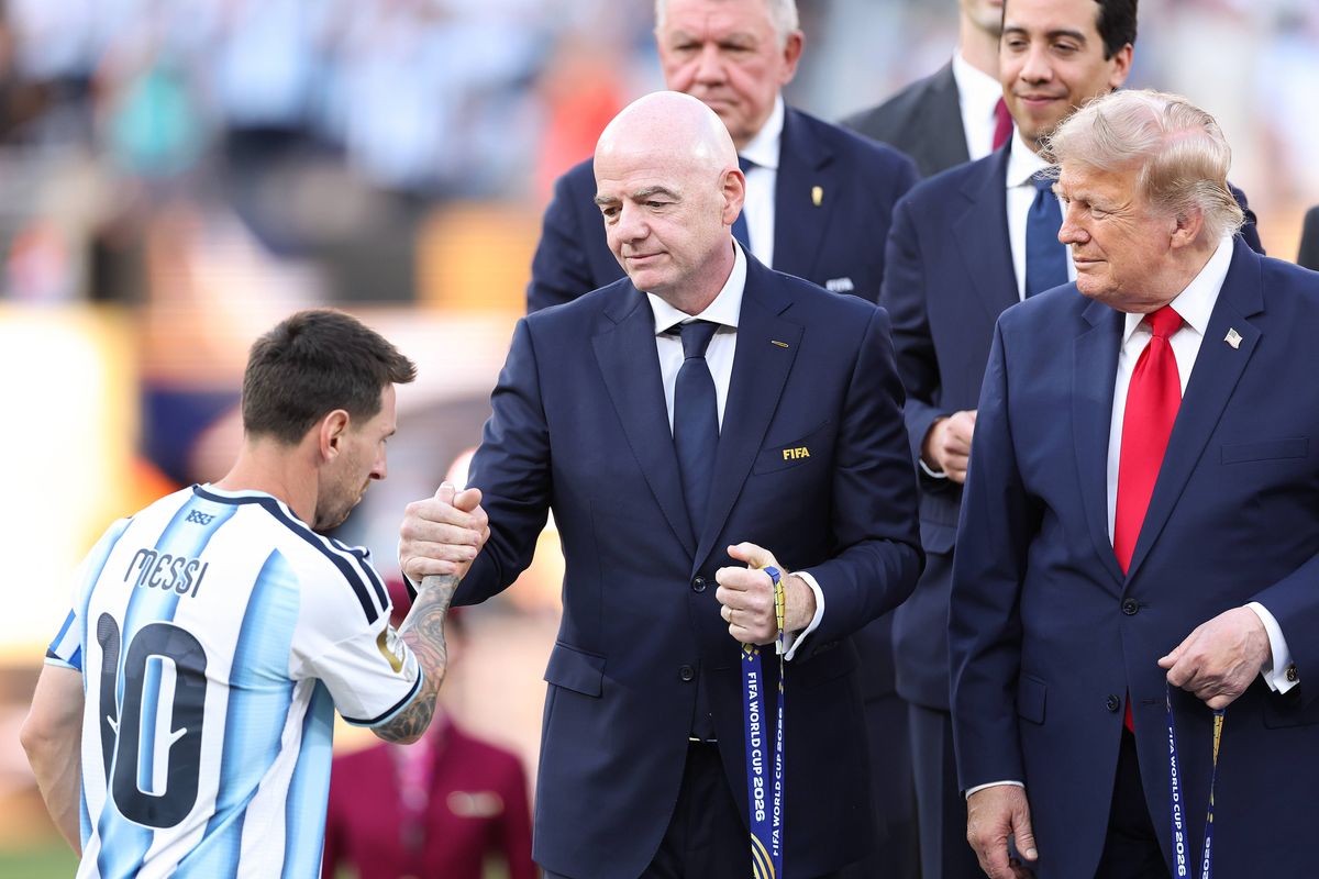 EAST RUTHERFORD, NEW JERSEY - JULY 19: Lionel Messi #10 of Argentina receives his runner-up medal from FIFA President Gianni Infantino and U.S. President Donald Trump after the FIFA World Cup 2026 Final match between Spain and Argentina at New York New Jersey Stadium on July 19, 2026 in East Rutherford, New Jersey. (Photo by Justin Setterfield/Getty Images)