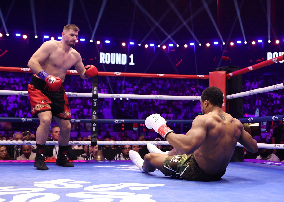 Anthony Joshua on the canvas during a boxing match
