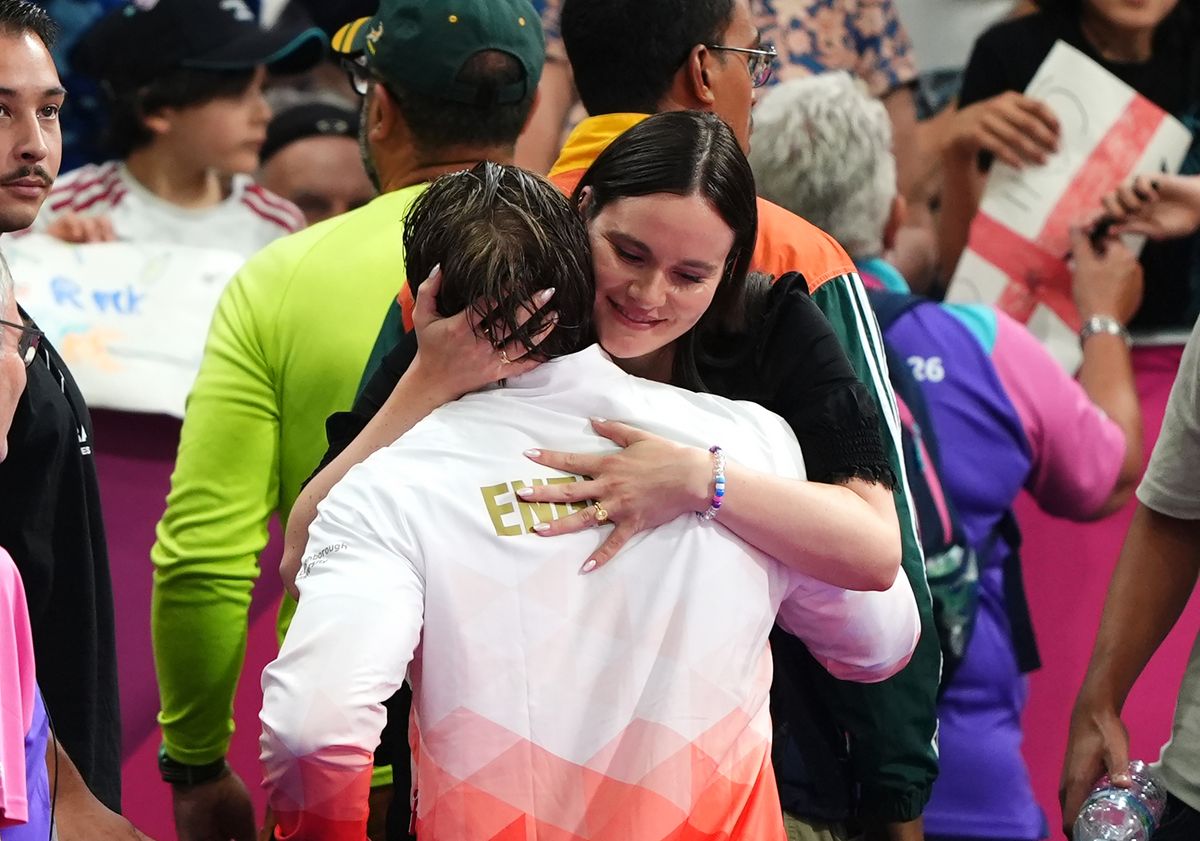 Adam Ramsay-Peaty is greeted by his wife Holly Ramsay-Peaty at the Tollcross International Swimming Centre