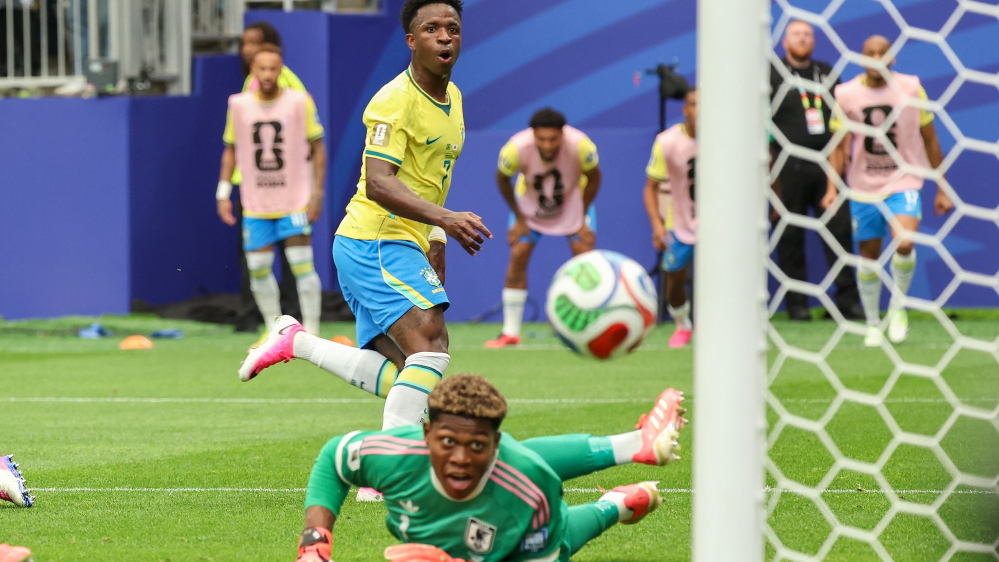 Suzuki tips Vinicius Junior's shot against the post during the World Cup clash with Brazil