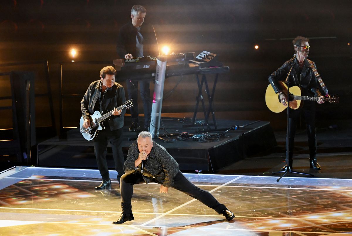 Jim Kerr of Simple Minds on stage at the closing ceremony of Glasgow 2026