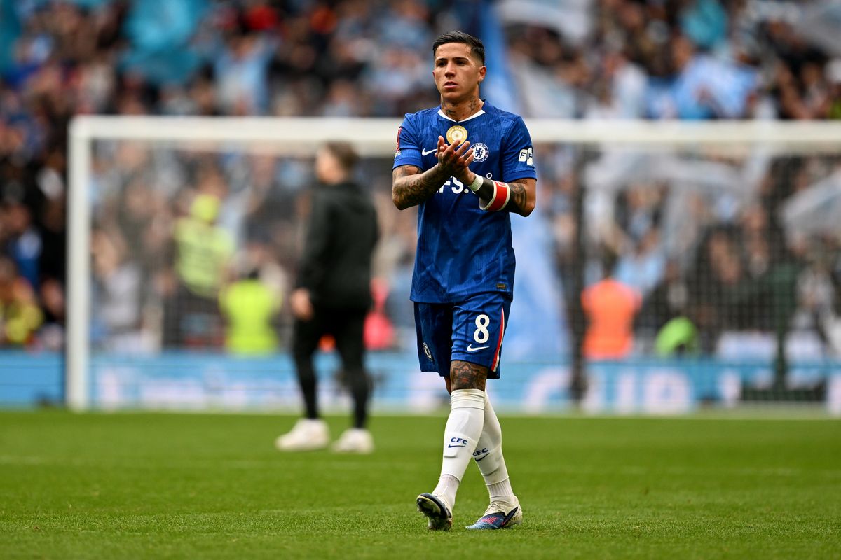 Enzo Fernandez of Chelsea applauds the fans following the team's defeat in the Emirates FA Cup Final match between Chelsea and Manchester City