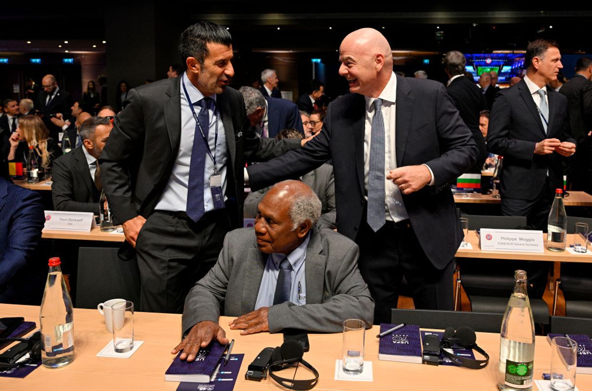 Luis Figo alongside Gianni Infantino in 2024