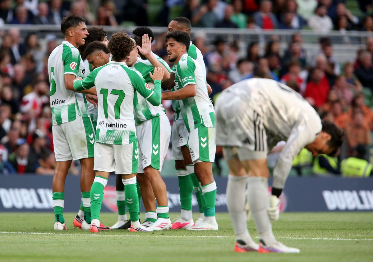 DUBLIN, IRELAND - AUGUST 05: Nelson Deossa of Real Betis Balompie celebrates scoring his team’s second goal with teammates during the pre-season friendly match between Arsenal FC and Real Betis Balompie at Aviva Stadium on August 05, 2026 in Dublin, Ireland. (Photo by Evan Treacy/Getty Images)