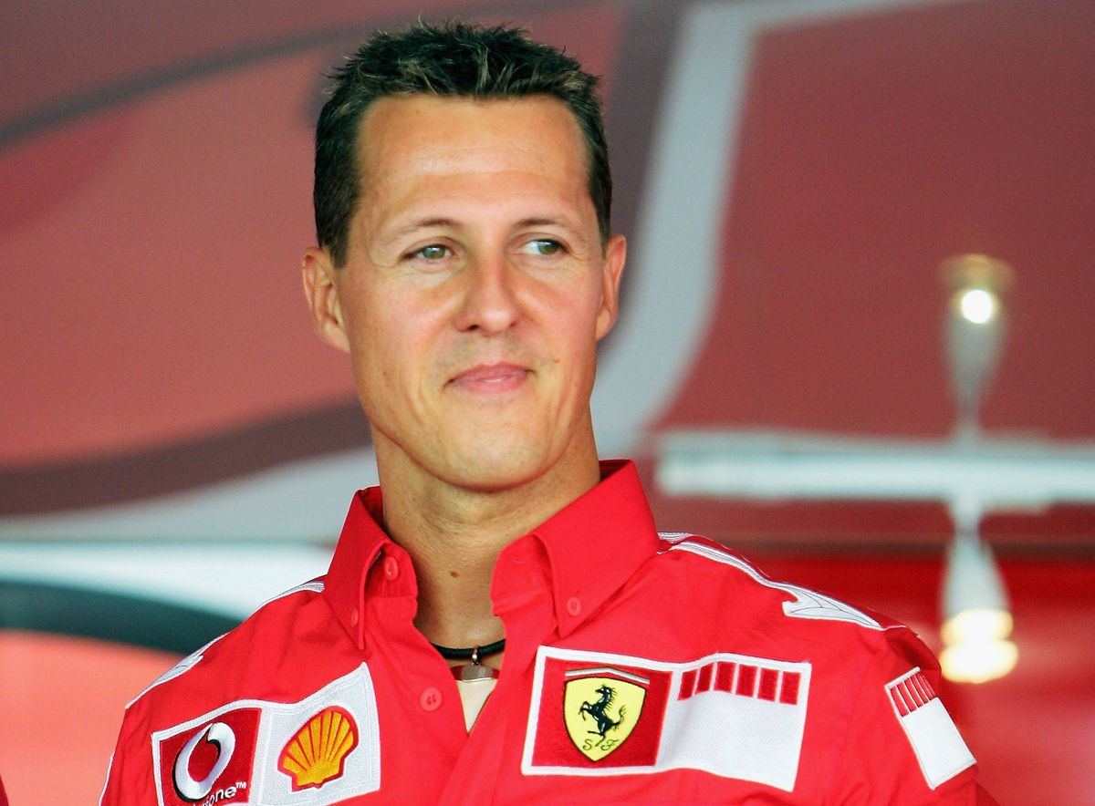 MONZA, ITALY - SEPTEMBER 01: Michael Schumacher of Germany and Ferrari smiles after the Vodafone Race on Piazza Duomo in Milan during the preview to the Italian F1 Grand Prix on September 1, 2005 in Monza, Italy. (Photo by Lars Baron/Bongarts/Getty Images)