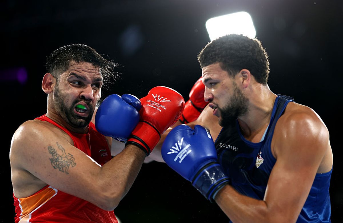 Damar Thomas takes on Narender Narender in the Men's 90+kg Final at the Commonwealth Games