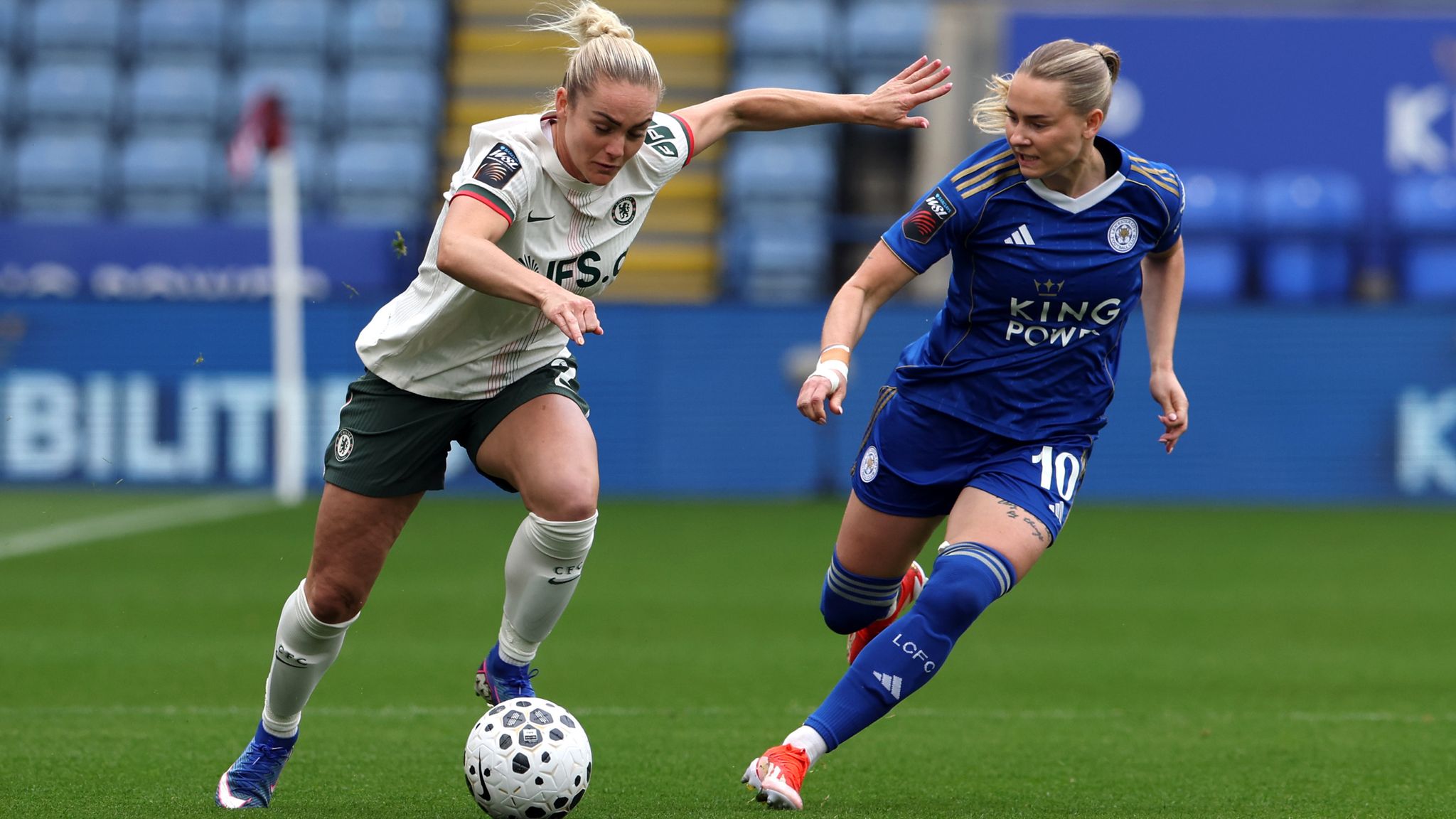Ellie Carpenter (left) joined Chelsea last summer