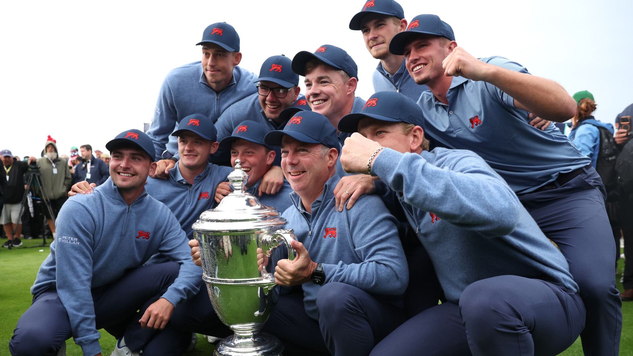 Great Britain and Ireland celebrate after winning the Walker Cup for the first time since 2015