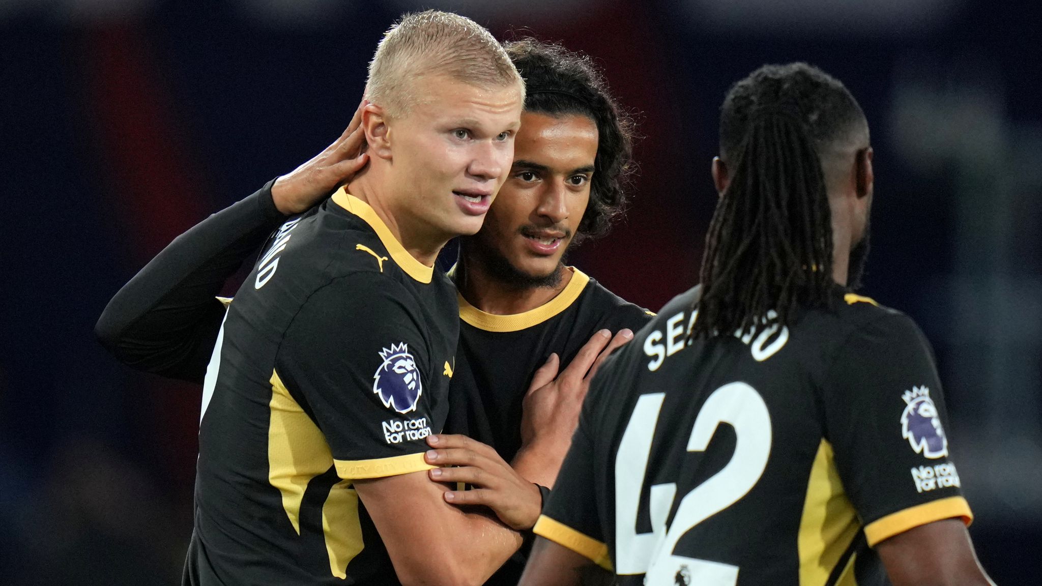 Erling Haaland, left, celebrates with Ayyoub Bouaddi after scoring Man City's opener against Porto