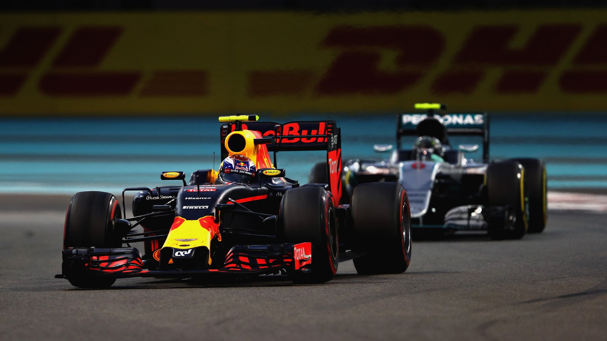 Max Verstappen holding up Nico Rosberg at the 2016 Abu Dhabi Grand Prix (Photo by Red Bull Content Pool/Clive Mason/Getty Images)