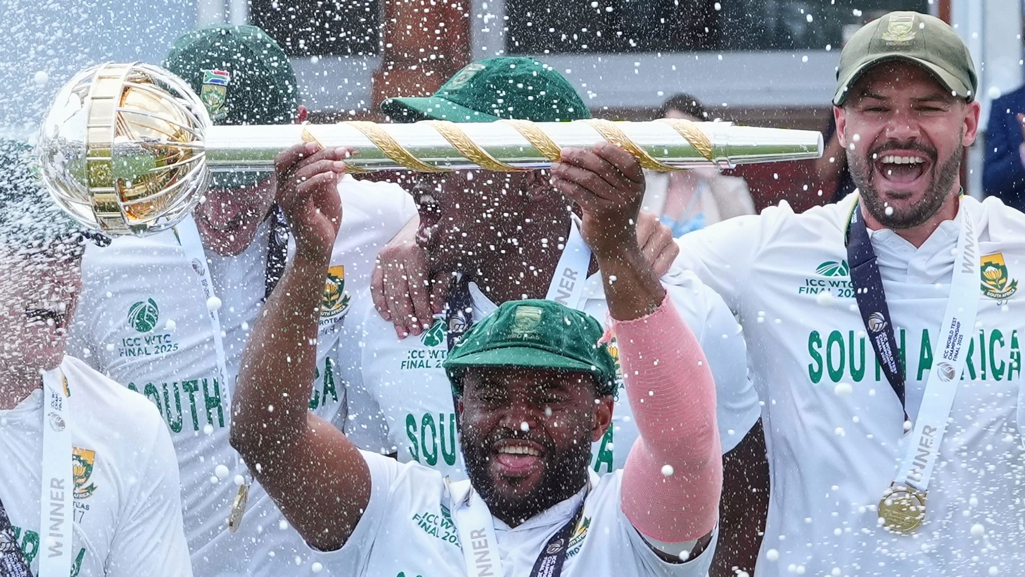 South Africa captain Temba Bavuma holds the mace aloft, awarded to the winners of the World Test Championship, after beating Australia at Lord's