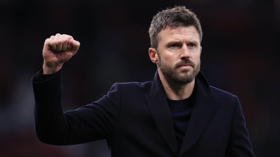 Manchester United interim boss Michael Carrick raises his fist in celebration after a Premier League win over Fulham