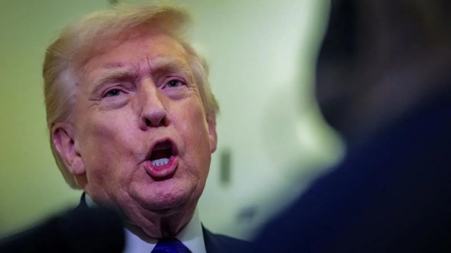  Trump speaks with members of the media on board Air Force One en route to Palm Beach