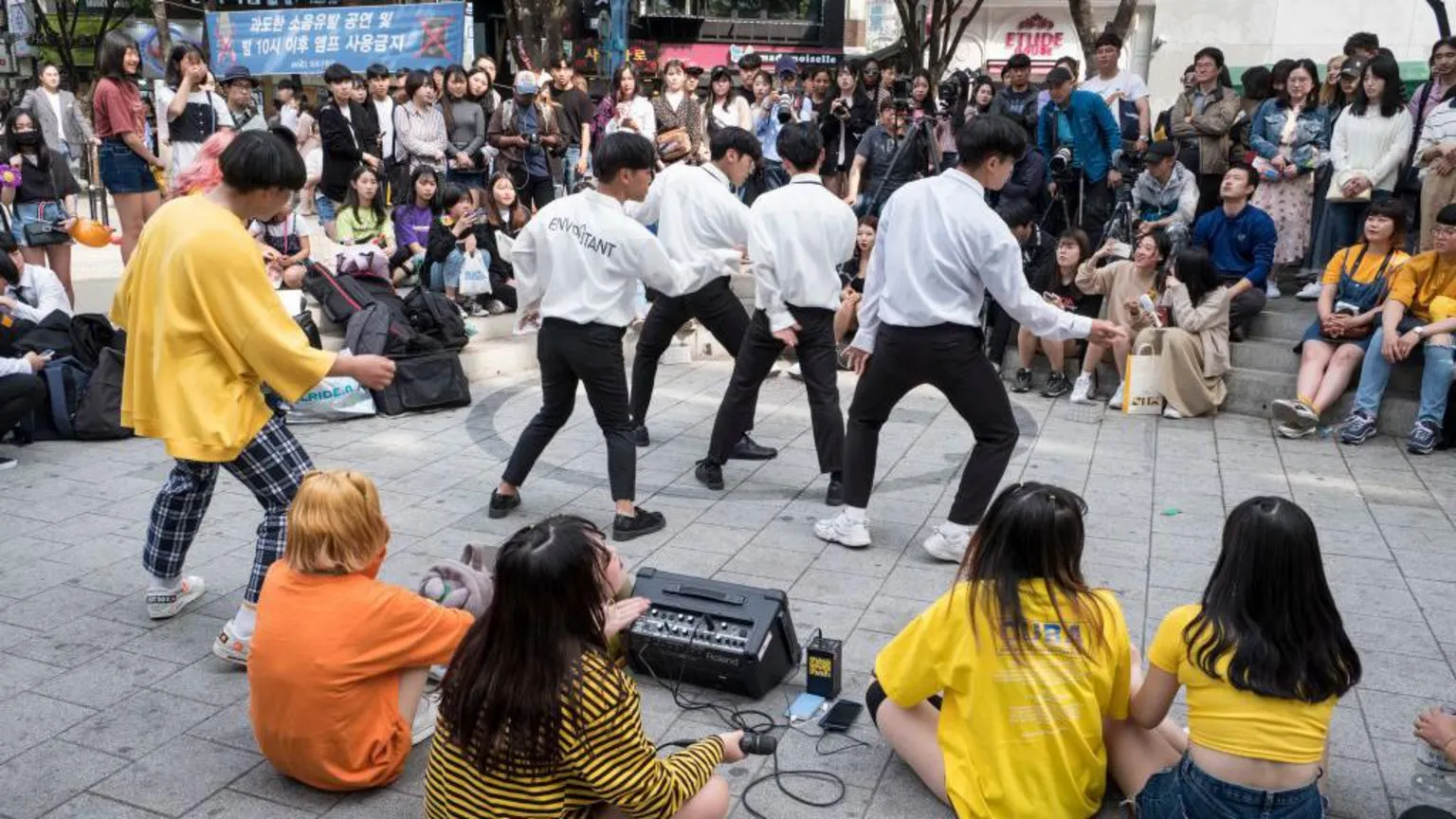  K-pop band in the district of Hongdae. 