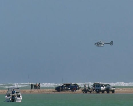 Emergency services near the scene of the light plane crash that killed three people near Goolwa South in South Australia