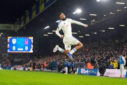 Jayden Bogle leaps in delight to celebrate his goal that opened the scoring for Leeds United against Nottingham Forest.