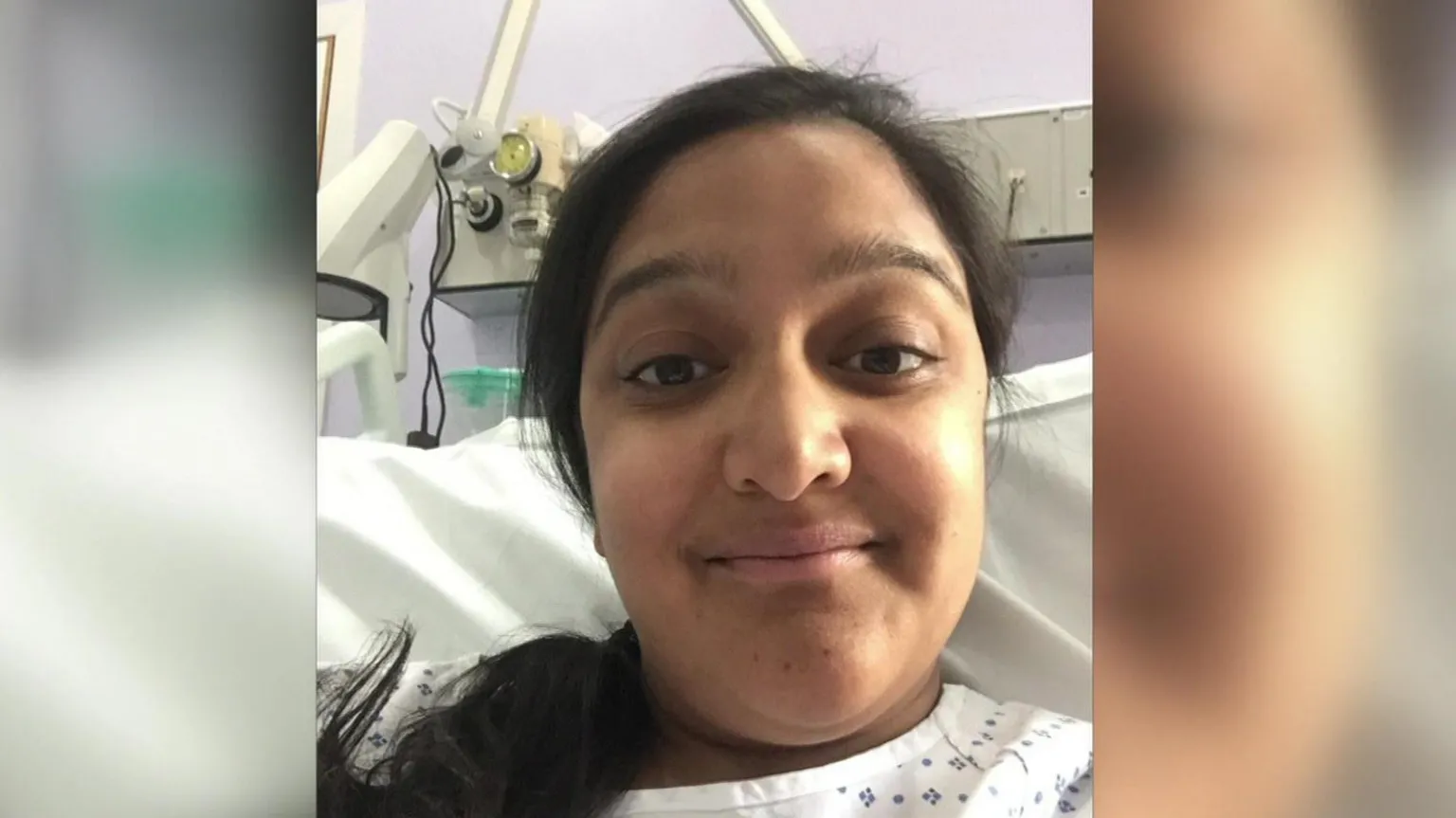 Sanju Pal Sanju Pal, with her black hair tied in a ponytail smiles, into the camera from her hospital bed