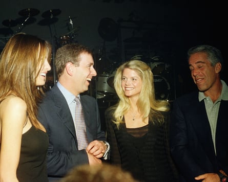 A group of people in suits and cocktail dresses.