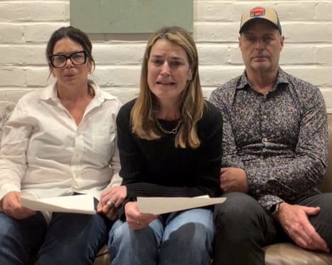 Three people on a couch