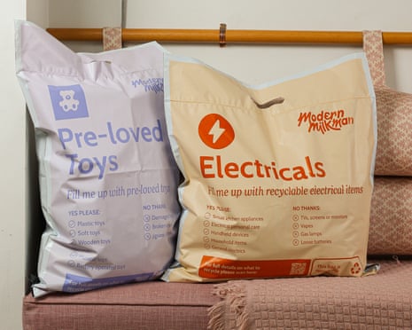 A 'pre-loved toys' bag and an 'electricals' recycling bag from Modern Milkman