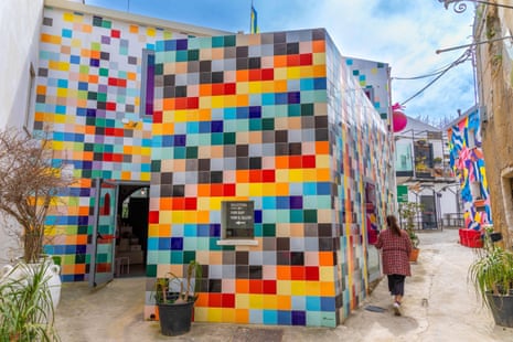 Multicoloured tiles on the outside of art studios