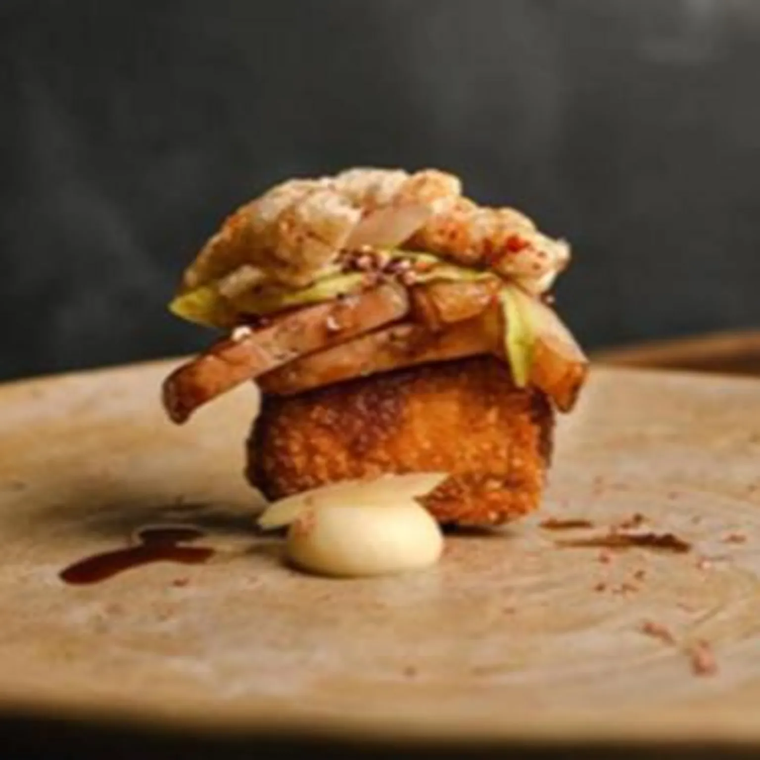 Instagram/Gwen restaurant A plate with pork on it 