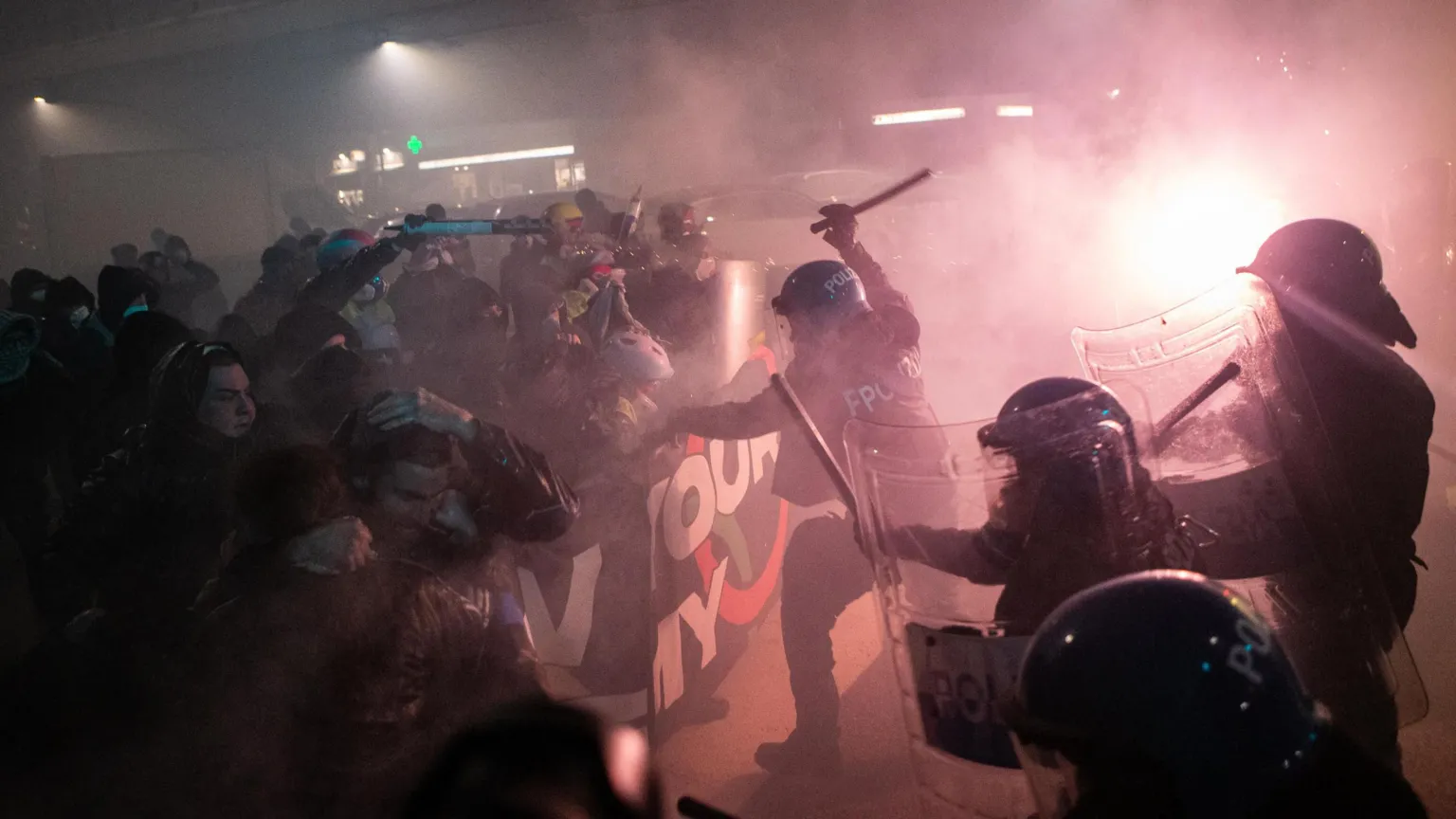 EPA/Shutterstock Demonstrators clash with police during a protest against the Milano Cortina 2026 Winter Olympics in Milan