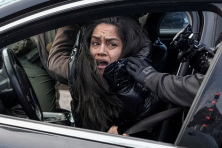 Woman dragged away from car