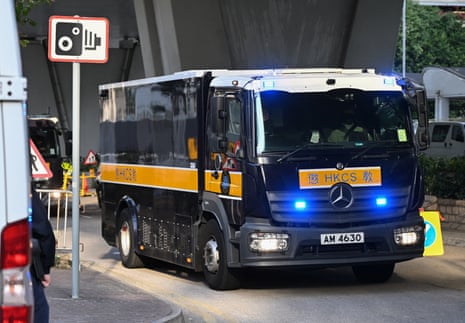 A correctional services vehicle in a convoy believed to be transporting convicted pro-democracy media tycoon Jimmy Lai arrives at the West Kowloon Magistrates' court in Hong Kong on Monday.