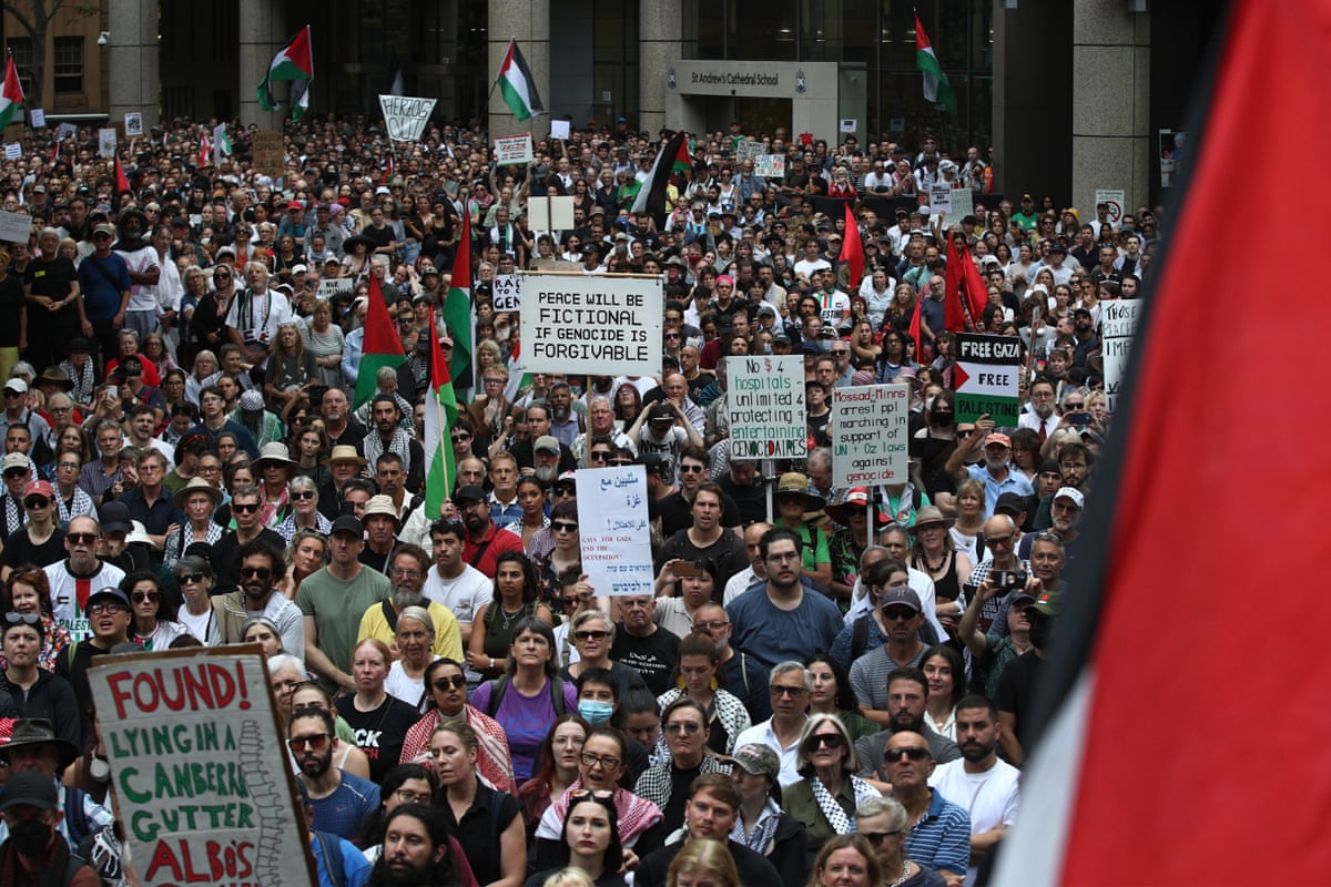 Protesters at Sydney’s Town Hall last night.