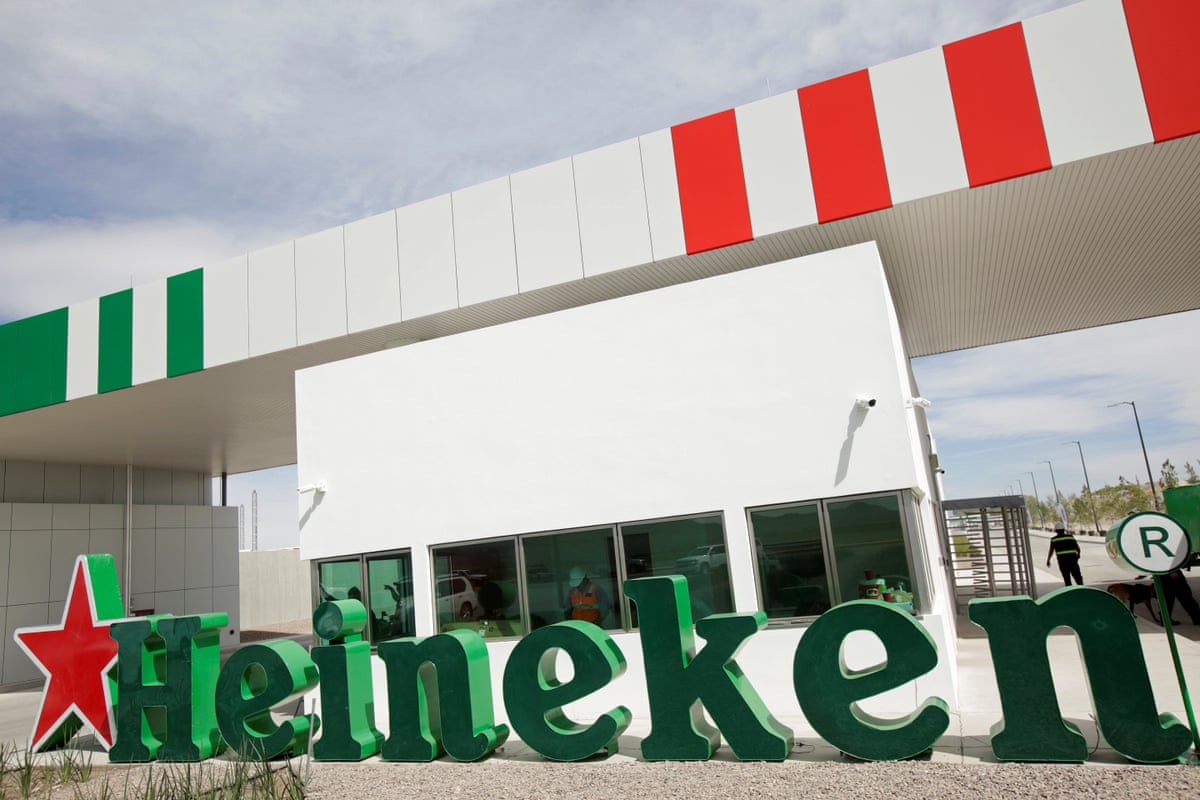 A Heineken sign is seen at the main access to the new Heineken brewery in Meoqui, in Chihuahua state, Mexico February 27, 2018.