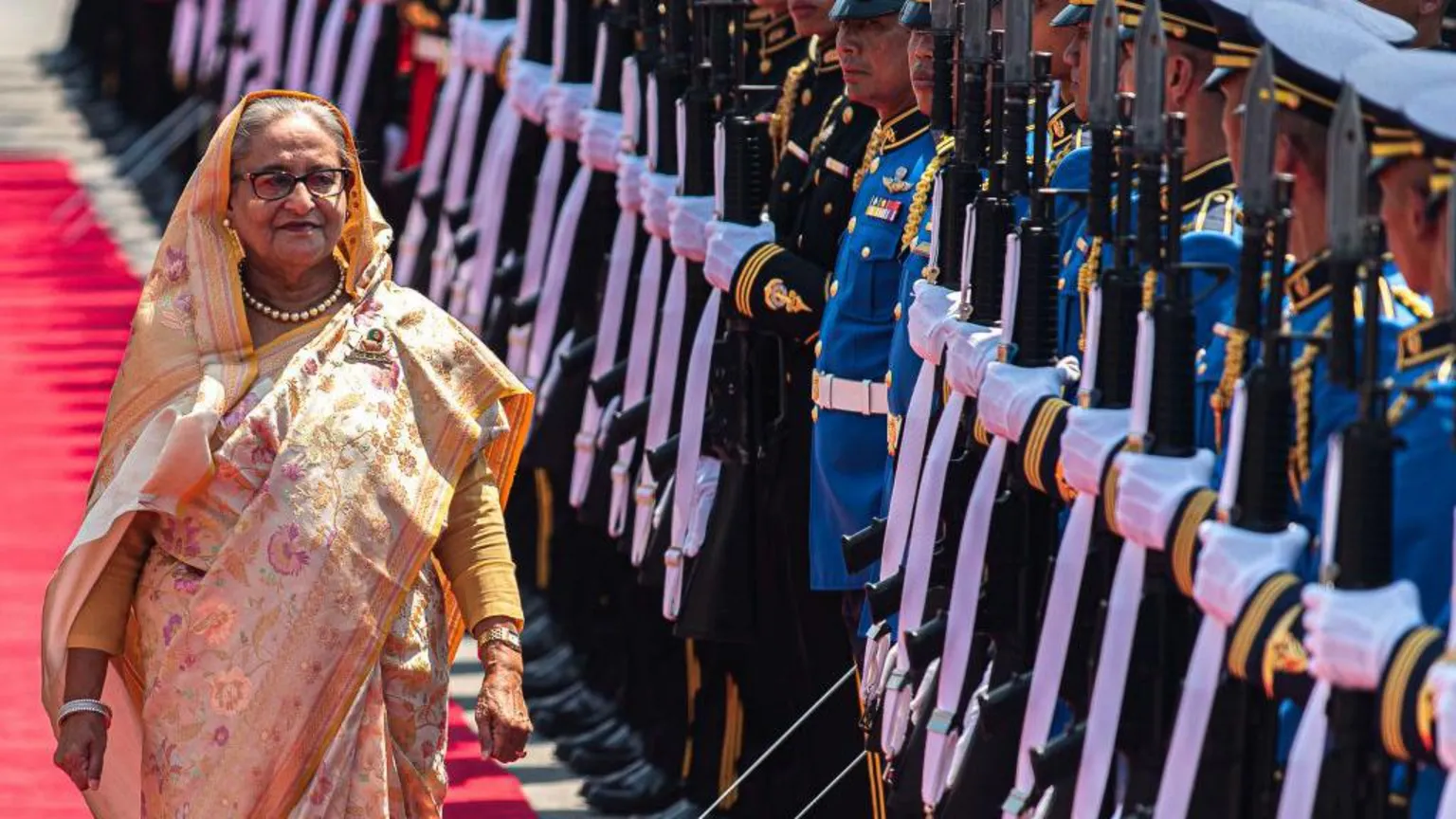  Bangladesh's former Prime Minister Sheikh Hasina inspects the guard of honour during a visit to Thailand in 2024