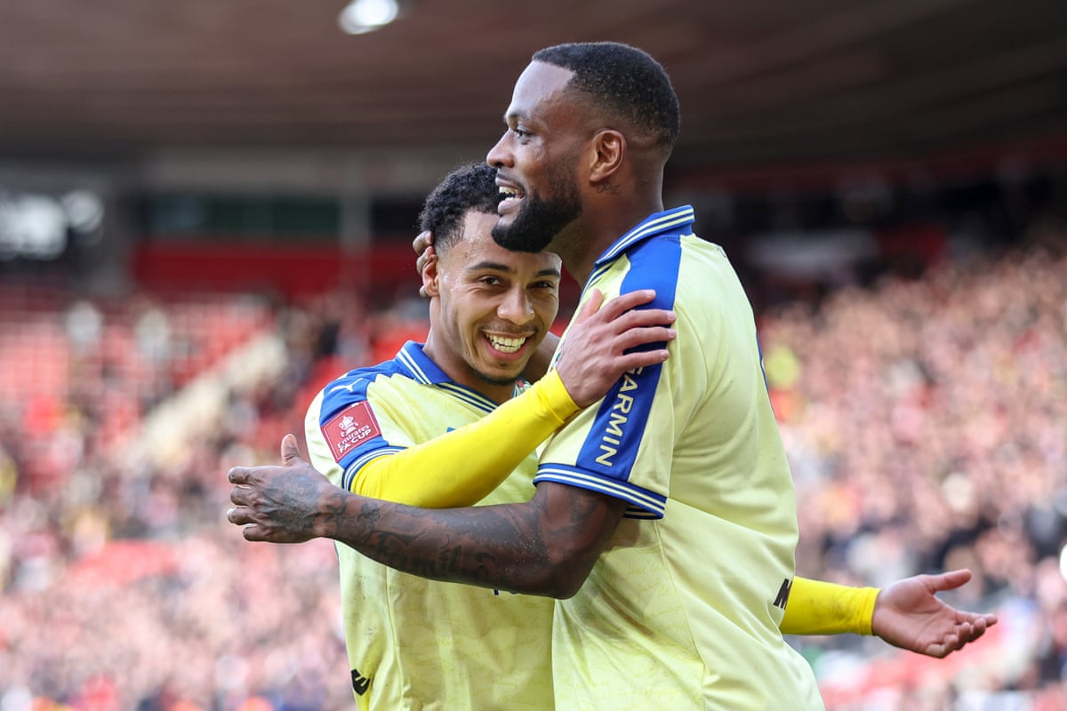 Cyle Larin of Southampton celebrates with team-mate Cameron Archer after scoring.