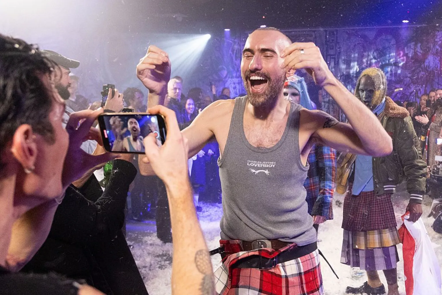  Designer Charles Jeffrey celebrating after his runway.