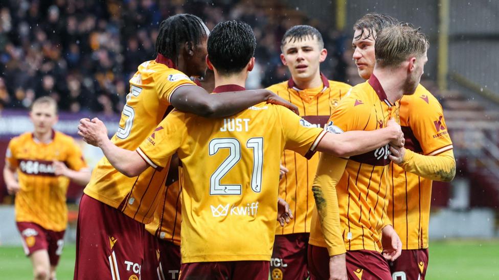 Motherwell celebrate defeating Aberdeen.