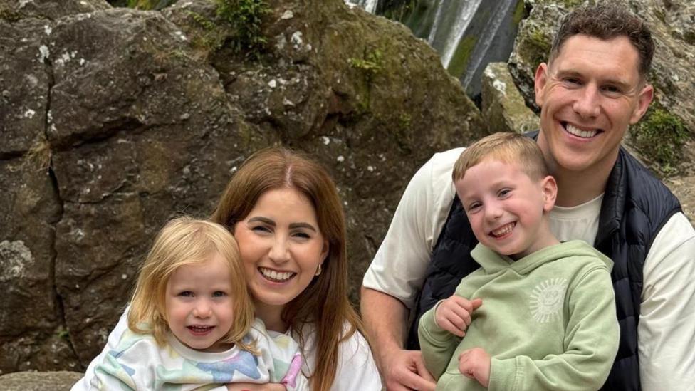 John McAreavey with Tara, James and Lily