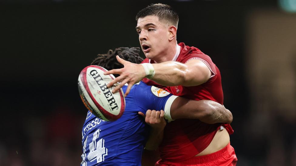 Joe Hawkins offloads for Wales against France at Principality Stadium