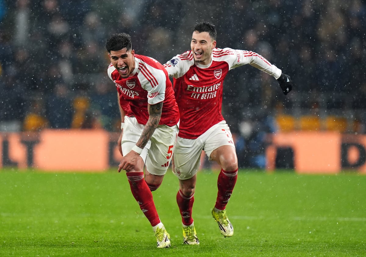 Arsenal's Piero Hincapie (left) celebrates scoring their side's second goal of the game at Wolves.