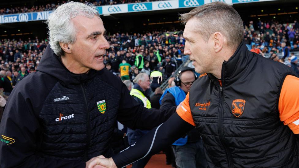 Jim McGuinness and Kieran McGeeney shake hands at Croke Park 