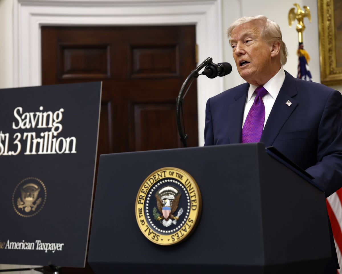 Trump behind lectern with US president seal on it, and board reading: ‘Saving $1.3 trillion’