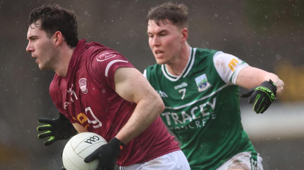 Westmeath's Sam McCartan is challenged by Ronan McCaffrey