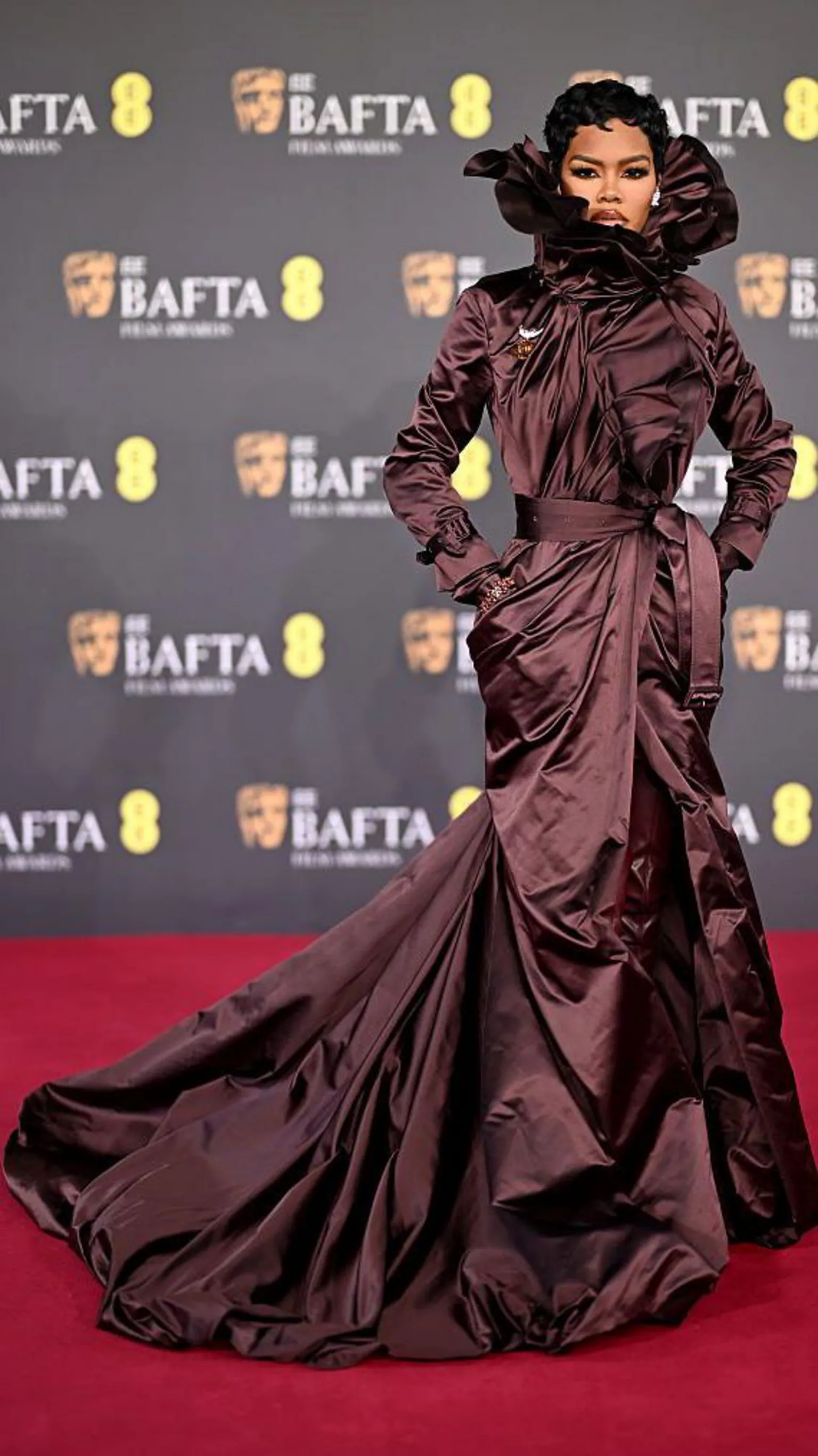 Teyana Taylor in a brown, silk ruffled dress