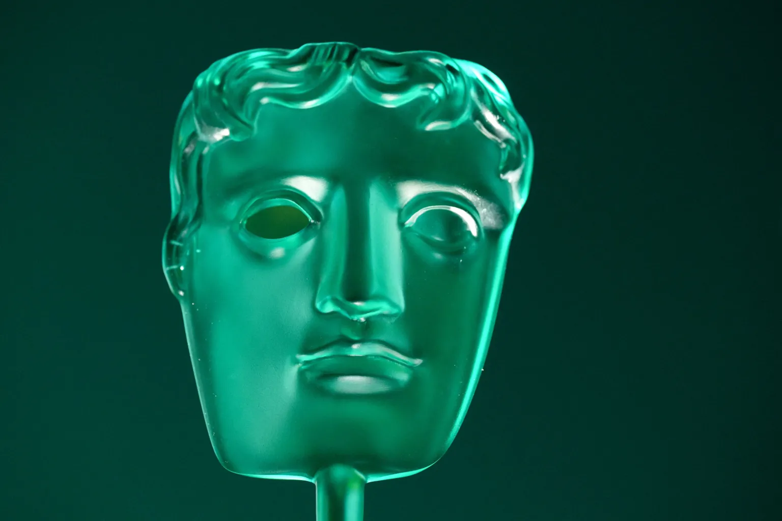  A green Bafta Rising Star Award trophy - of a generic face 